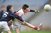 16 December 2008; Lucas Seoighe, Scoil Chrónáin, in action against Dean Ellis, St. Bernadette's. St. Bernadette's, Quarryvale v Scoil Chrónáin, Rathcoole, Corn an Chéid Final, Allianz Cumann na mBunscoil football finals, Croke Park, Dublin. Picture credit: David Maher / SPORTSFILE