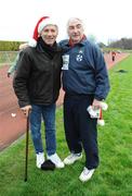 25 December 2008; Former World 5,000m Champion Eamonn Coghlan, who is recovering from a recent accident, with Goal's John O'Shea after one of the many Goal Miles at the athletics track in UCD, Belfield, Dublin. This year the event took place at 72 locations around Ireland. Annual Goal Mile, Belfield, University College, Dublin. Picture credit: Ray McManus / SPORTSFILE