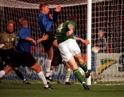 11 October 2000; Richard Dunne of Ireland shoots to score his side's second goal during the World Cup 2002 Qualifying group 2 match between Republic of Ireland and Estonia at Lansdowne Road in Dublin. Photo by David Maher/Sportsfile