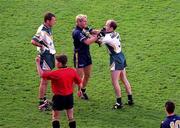 8 October 2000; Peter Canavan of Ireland and Jason Akermanis of Australia tussle as Anthony Tohill, left, looks on during the International Rules Series First Test match between Ireland and Australia at Croke Park in Dublin. Photo by Ray McManus/Sportsfile