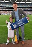 9 August 2015; Liberty Insurance flagbearer Alex Flannigan, age 7, a member of St. Judes GAA Club in Templeogue, Dublin, with Wexford hurler Lee Chin at the GAA Hurling All Ireland Senior Hurling Semi-final between Kilkenny & Waterford. Croke Park, Dublin. Picture credit: Brendan Moran / SPORTSFILE