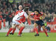 3 January 2009; Doug Howlett, Munster, is tackled by Ed O'Donoghue, Ulster. Magners League, Munster v Ulster, Thomond Park Stadium, Limerick. Picture credit: Brendan Moran / SPORTSFILE