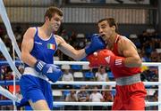 11 August 2015; Adam Nolan, Ireland, left, exchanges punches with Radzhab Butaev, Russia, during their 69kg Welterweight preliminary bout. EUBC Elite European Boxing Championships, Samokov, Bulgaria. Picture credit: Pat Murphy / SPORTSFILE