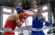 11 August 2015; Adam Nolan, Ireland, right, exchanges punches with Radzhab Butaev, Russia, during their 69kg Welterweight preliminary bout. EUBC Elite European Boxing Championships, Samokov, Bulgaria. Picture credit: Pat Murphy / SPORTSFILE