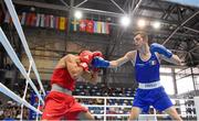 11 August 2015; Adam Nolan, Ireland, right, exchanges punches with Radzhab Butaev, Russia, during their 69kg Welterweight preliminary bout. EUBC Elite European Boxing Championships, Samokov, Bulgaria. Picture credit: Pat Murphy / SPORTSFILE