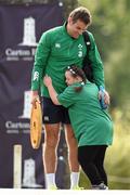 13 August 2015; Ireland's Jared Payne receives a hug from Ireland rugby supporter Jennifer Malone, from Clane, Co. Kildare, as he arrives for squad training. Ireland Rugby Squad Training, Carton House, Maynooth, Co. Kildare. Picture credit: Stephen McCarthy / SPORTSFILE