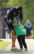 13 August 2015; Ireland's Simon Zebo receives a hug from Ireland rugby supporter Jennifer Malone, from Clane, Co. Kildare, as he arrives for squad training. Ireland Rugby Squad Training, Carton House, Maynooth, Co. Kildare. Picture credit: Stephen McCarthy / SPORTSFILE