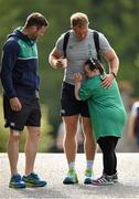 13 August 2015; Ireland's Luke Fitzgerald, in the company of Fergus McFadden, receives a hug from Ireland rugby supporter Jennifer Malone, from Clane, Co. Kildare, as he arrives for squad training. Ireland Rugby Squad Training, Carton House, Maynooth, Co. Kildare. Picture credit: Stephen McCarthy / SPORTSFILE