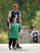13 August 2015; Ireland's Tommy Bowe poses for a picture with Ireland rugby supporter Jennifer Malone, from Clane, Co. Kildare, as he arrives for squad training. Ireland Rugby Squad Training, Carton House, Maynooth, Co. Kildare. Picture credit: Stephen McCarthy / SPORTSFILE