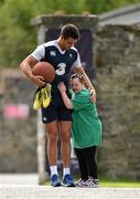 13 August 2015; Ireland's Conor Murray receives a hug from Ireland rugby supporter Jennifer Malone, from Clane, Co. Kildare, as he arrives for squad training. Ireland Rugby Squad Training, Carton House, Maynooth, Co. Kildare. Picture credit: Stephen McCarthy / SPORTSFILE