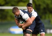 13 August 2015; Ireland's Sean O'Brien is tackled by Conor Murray during squad training. Ireland Rugby Squad Training, Carton House, Maynooth, Co. Kildare. Picture credit: Stephen McCarthy / SPORTSFILE