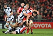 16 January 2009; David Wallace, Munster, is tackled by Eifion Roberts and Marc Jones, Sale Sharks. Heineken Cup, Pool 1, Round 5, Munster v Sale Sharks, Thomond Park, Limerick. Picture credit: Brendan Moran / SPORTSFILE