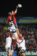 16 January 2009; Alan Quinlan, Munster, takes the ball in the lineout against Sabastien Chabal, Sale Sharks. Heineken Cup, Pool 1, Round 5, Munster v Sale Sharks, Thomond Park, Limerick. Picture credit: Matt Browne / SPORTSFILE