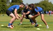 13 August 2015; Leinster women Sophie Spence, Fiona Coghlan, Nora Stapleton, Sharon Lynch, Elise O'Byrne Whyte and Elsa Hughes visited the girls camp at the Bank of Ireland School of Excellence in the King's Hospital, Palmerstown, Dublin. Picture credit: Seb Daly / SPORTSFILE