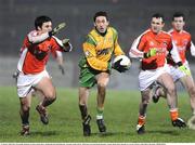 21 January 2009; Rory Kavanagh, Donegal, in action against Barry McDonald and Neil O'Rourke, Armagh. Gaelic Life Dr. McKenna Cup Semi-Final, Donegal v Armagh, Healy Park, Omagh, Co. Tyrone. Picture credit: Oliver McVeigh / SPORTSFILE