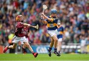 16 August 2015; Tom Mathews, Scoil Bhríde, Dunleer, Louth, representing Tipperary, in action against Michael Morgan, Scoil Ursula, Sligo, representing Galway, during the Cumann na mBunscol INTO Respect Exhibition Go Games 2015 at Tipperary v Galway - GAA Hurling All-Ireland Senior Championship Semi-Final. Croke Park, Dublin. Picture credit: Ray McManus / SPORTSFILE