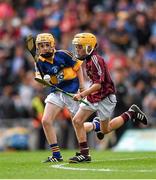 16 August 2015; Andrew Kelly, Ballintotas NS, Castlemartyr, Cork, representing Galway, in action against James Corcoran, St. Colmcilles Templemore, Tipperary, during the Cumann na mBunscol INTO Respect Exhibition Go Games 2015 at Tipperary v Galway - GAA Hurling All-Ireland Senior Championship Semi-Final. Croke Park, Dublin. Picture credit: Ray McManus / SPORTSFILE