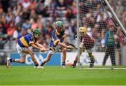 16 August 2015; Liam Doyle, Gaile NS, Holycross, Thurles, Tipperary, and Mikey Bergin, Golden NS, Cashel, Tipperary, in action against Andrew Kelly, Ballintotas NS, Castlemartyr, Cork, representing Galway, during the Cumann na mBunscol INTO Respect Exhibition Go Games 2015 at Tipperary v Galway - GAA Hurling All-Ireland Senior Championship Semi-Final. Croke Park, Dublin. Picture credit: Ray McManus / SPORTSFILE