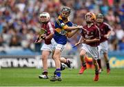 16 August 2015; Aidan Connor, Ballybrown NS, Clarina, Limerick, representing Tipperary, in action against Michael Morgan, Scoil Ursula, Sligo, representing Galway, during the Cumann na mBunscol INTO Respect Exhibition Go Games 2015 at Tipperary v Galway - GAA Hurling All-Ireland Senior Championship Semi-Final. Croke Park, Dublin. Picture credit: Stephen McCarthy / SPORTSFILE