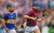 16 August 2015; Daniel Treen, from Garranbane NS, Dungarvam, Waterford, representing Galway, in action against Aidan Connor, from Ballybrown NS, Clarina, Limerick, representing Tipperary, during the Cumann na mBunscol INTO Respect Exhibition Go Games 2015 at Tipperary v Galway - GAA Hurling All-Ireland Senior Championship Semi-Final. Croke Park, Dublin. Picture credit: Piaras Ó Mídheach / SPORTSFILE