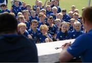 18 August 2015; Leinster rugby players Jamie Hagan and Tom Denton visited the Bank of Ireland Summer Camp in Clontarf FC for a Q&A session, autograph signings, and a few games on the pitch. Clontarf FC, Castle Avenue, Dublin. Picture credit: Sam Barnes / SPORTSFILE