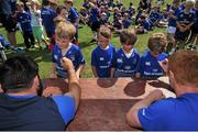 18 August 2015; Leinster rugby players Jamie Hagan and Tom Denton visited the Bank of Ireland Summer Camp in Clontarf FC for a Q&A session, autograph signings, and a few games on the pitch. Clontarf FC, Castle Avenue, Dublin. Picture credit: Sam Barnes / SPORTSFILE