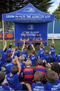 18 August 2015; Leinster rugby players Jamie Hagan and Tom Denton visited the Bank of Ireland Summer Camp in Clontarf FC for a Q&A session, autograph signings, and a few games on the pitch. Clontarf FC, Castle Avenue, Dublin. Picture credit: Sam Barnes / SPORTSFILE