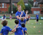 18 August 2015; Leinster rugby players Jamie Hagan and Tom Denton visited the Bank of Ireland Summer Camp in Clontarf FC for a Q&A session, autograph signings, and a few games on the pitch. Clontarf FC, Castle Avenue, Dublin. Picture credit: Sam Barnes / SPORTSFILE