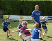 18 August 2015; Leinster rugby players Jamie Hagan and Tom Denton visited the Bank of Ireland Summer Camp in Clontarf FC for a Q&A session, autograph signings, and a few games on the pitch. Clontarf FC, Castle Avenue, Dublin. Picture credit: Sam Barnes / SPORTSFILE