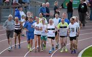 18 August 2015; Frank Greally, with Catherina McKiernan to his right, Olympic silver medalist John Treacy, left, Neil Cusack, former Boston Marathon winner, who set a record for the 10,000M 45 years ago on this day, pictured as he leads the pack around Morton Stadium for 30.17 - the record time set on the night. Frank Greally's Gratitude Run. Morton Stadium, Dublin Picture credit: Ray McManus / SPORTSFILE