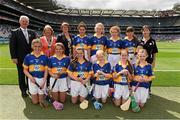 16 August 2015; Uachtarán Chumann Lúthchleas Gael Aogán Ó Fearghail, President of the INTO Emma Dineen, President of Cumann na mBunscoil Maireád O'Callaghan, with the Tipperary camogie team, back row, left to right, Hannah Lavery, Victoria College Prep School, Belfast, Antrim, Orla Donnelly, Glenravel Primary, Martinstown, Ballymena, Antrim, Brid Magill, St. Brigid’s PS, Cloughmills, Ballymena, Antrim, Ciara Doran, St. Mary’s PS, Portaferry, Down, front row, left to right, Ellen Sylvester, Holy Family SNS, Swords, Dublin, Moya Byrnes, Scoil Seanáin Naofa, Clonlara NS, Clare, Amber Finnegan, St. Pius X GNS, Fortfield Park, Dublin, Maria Kealy, Woodlands NS, Letterkenny, Donegal, Tara Monan, St. Patrick’s PS, Ballygallet, Portaferry, Down, Cadhla Magennis, St. Joseph’s PS, Meigh, Killeavey, Newry, Down, before the Cumann na mBunscol INTO Respect Exhibition Go Games 2015 at Tipperary v Galway - GAA Hurling All-Ireland Senior Championship Semi-Final. Croke Park, Dublin. Picture credit: Ray McManus / SPORTSFILE