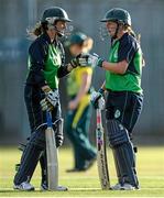 19 August 2015; Cecelia Joyce and Laura Delany, Ireland, talk between overs. Women's Twenty20 International, Ireland v Australia. YMCA CC, Sandymount, Dublin. Picture credit: Sam Barnes / SPORTSFILE