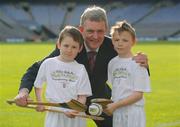 2 February 2009; AIB today joined forces with the GAA, to launch a new initiative, the 'GAA Play & Stay introductory blitzes’, aimed at increasing the participation of young people in Gaelic games. The blitzes will take place in over 530 centres across the 32 counties during the months of May and June 2009 for girls and boys aged between 7 and 8. Pictured at the launch are: Nicky English, Manager, AIB with Niall Brennan, left and Aaron Boylan, pupils of the Holy Trinity School, Donaghmede. Picture credit: Ray McManus / SPORTSFILE