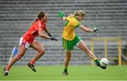 22 August 2015; Yvonne McMonagle, Donegal, scores her sides first goal despite the efforts of Sharon Reel, Armagh. TG4 Ladies Football All-Ireland Senior Championship, Quarter-Final, Donegal v Armagh. St Tiernach's Park, Clones, Co. Monaghan. Picture credit: Piaras Ó Mídheach / SPORTSFILE