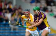 22 August 2015; Conor McDonald, Wexford, in action against Maoi Connolly, Antrim. Bord Gáis Energy GAA Hurling All Ireland U21 Championship, Semi-Final, Wexford v Antrim. Semple Stadium, Thurles, Co. Tipperary. Picture credit: Dáire Brennan / SPORTSFILE