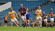 22 August 2015; Padraig Foley, Wexford, in action against James Connolly, Antrim. Bord Gáis Energy GAA Hurling All Ireland U21 Championship, Semi-Final, Wexford v Antrim. Semple Stadium, Thurles, Co. Tipperary. Picture credit: Ray McManus / SPORTSFILE