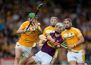 22 August 2015; Cathal Dunbar, Wexford, in action against Gerard Walsh, Antrim. Bord Gáis Energy GAA Hurling All Ireland U21 Championship, Semi-Final, Wexford v Antrim. Semple Stadium, Thurles, Co. Tipperary. Picture credit: Dáire Brennan / SPORTSFILE