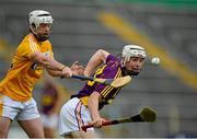 22 August 2015; Cathal Dunbar, Wexford, in action against Michael Dudley, Antrim. Bord Gáis Energy GAA Hurling All Ireland U21 Championship, Semi-Final, Wexford v Antrim. Semple Stadium, Thurles, Co. Tipperary. Picture credit: Dáire Brennan / SPORTSFILE