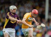 22 August 2015; Donal O'Hara, Antrim, in action against Cathal Dunbar, Wexford. Bord Gáis Energy GAA Hurling All Ireland U21 Championship, Semi-Final, Wexford v Antrim. Semple Stadium, Thurles, Co. Tipperary. Picture credit: Dáire Brennan / SPORTSFILE
