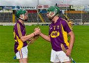 22 August 2015; Wexford players Conor Devitt and Jake Firman, left, celebrate after the game. Bord Gáis Energy GAA Hurling All Ireland U21 Championship, Semi-Final, Wexford v Antrim. Semple Stadium, Thurles, Co. Tipperary. Picture credit: Ray McManus / SPORTSFILE
