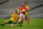 22 August 2015; Aoife McCoy, Armagh, in action against Donegal's Niamh McLaughlin, left, Nicole McLaughlin, and Aoife McDonnell, behind. TG4 Ladies Football All-Ireland Senior Championship, Quarter-Final, Donegal v Armagh. St Tiernach's Park, Clones, Co. Monaghan. Picture credit: Piaras Ó Mídheach / SPORTSFILE