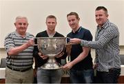 22 August 2015; Kerry legend Tomás Ó Sé with Bernard, Robert and Damien Hand, from Donaghmede, Dublin, at the Bord Gáis Energy Legends Tour at Croke Park, where he relived some of most memorable moments from his playing career. All Bord Gáis Energy Legends Tours include a trip to the GAA Museum, which is home to many exclusive exhibits, including the official GAA Hall of Fame. For booking and ticket information about the GAA legends for this summer visit www.crokepark.ie/gaa-museum. Croke Park, Dublin. Picture credit: Brendan Moran / SPORTSFILE