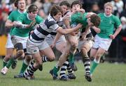 12 February 2009; Daniel Diviney, Gonzaga College, is tackled by Colly O'Shea, Greg Slattery and Enda McCarthy, Belvedere College. Leinster Schools Senior Cup 2nd Round, Belvedere College v Gonzaga College. Stradbrook Road, Dublin. Picture credit: Matt Browne / SPORTSFILE