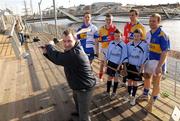 10 February 2009; Karl Manning, Director of Retail Sales at Halifax, tries out his hurling skills as hurlers, from left, Monaghan's Michael McHugh, Louth's Brian McCabe, Clare's Tony Griffin and Tipperary's Diarmuid Fitzgerald look on with twins Patrick and Simon O'Reilly, from Our Ladys National School, Balinteer, at todays announcement of plans for the 2009 Halifax GPA Hurling Twinning Programme.  The scheme will be expanded over the next twelve months with increased squad visits following the success of last year’s inaugural programme. Clarion Hotel, IFSC, Dublin. Photo by Sportsfile