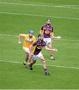 22 August 2015; Tony Ffrench, Wexford, in action against Christy McNaughton, Antrim. Bord Gáis Energy GAA Hurling All Ireland U21 Championship, Semi-Final, Wexford v Antrim. Semple Stadium, Thurles, Co. Tipperary. Picture credit: Dáire Brennan / SPORTSFILE