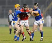 14 February 2009; Craig Leahy, Cork, in action against Pa Bourke, left, and John Devane, Tipperary. Allianz GAA National Hurling League, Division 1 Round 2, Tipperary v Cork, Semple Stadium, Thurles. Picture credit: Pat Murphy / SPORTSFILE