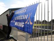 15 February 2009; Former Dublin manager and secretary of the Friends of Dublin hurling Humphrey Kelleher hangs up a banner before the game. Allianz National Hurling League, Division 1, Round 2, Dublin v Galway, Parnell Park, Dublin. Picture credit: Daire Brennan / SPORTSFILE