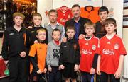 12 February 2009; St Kevin's Boys Club, the famous northside nursery, announced the signing of an Academy partnership with Premiership high flyers Liverpool F.C. Pictured at the announcment are Stuart Gelling, Liverpool Academy, and former Liverpool and Republic of Ireland international John Aldridge with members of the St Kevins Boys Club. St Kevins Boys Club, Larkhill Road, Whitehall, Dublin. Picture credit: Stephen McCarthy / SPORTSFILE