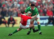 1 April 2000; Shane Horgan of Ireland is tackled by Shane Williams of Wales during the Lloyds TSB 6 Nations match between Ireland and Wales at Lansdowne Road in Dublin. Photo by Damien Eagers/Sportsfile