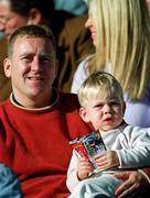 14 October 2000; Former Dublin footballer Keith Barr with his son during the Evening Herald Dublin Senior Football Championship Final match between Na Fianna and Kilmacud Crokes at Parnell Park in Dublin. Photo by Damien Eagers/Sportsfile